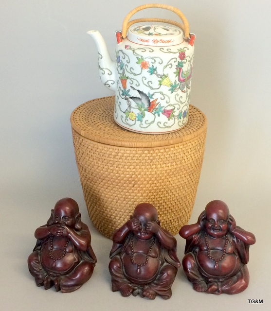 A Chinese teapot in its basket & 3 Buddha figures