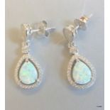 A pair of silver CZ and opalite pear shaped drop earrings