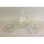 Collection of crystal glass flower bowls and wall jug