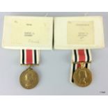 Two Elizabeth II Special Constabulary Long Service Medals in their boxes of issue named to Harvey