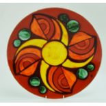 A Poole Pottery Delphis Charger. 35cm diameter