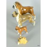 A collection of Beswick Boxer Dog Figures