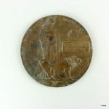 A WW1 Memorial Plaque or Death Penny named to John Charles Downey of the 1st/7th Battalion London