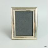 a silver easel back picture frame