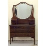 Inlaid mahogany mirror backed dressing table on tapered legs and casters, 2 jewellery drawers with