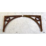 A matching pair of Victorian cast iron wall brackets 44cms deep by 40cms high