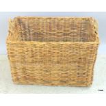 A medium oblong log basket with handles