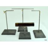 Four vintage shop counter Jewellery display stands on cast iron bases