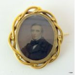 Gilt miniature of a Gentleman in the shape of a brooch 6 x 5cm