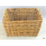 An extra large oblong log basket with handles