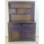 An oak linin fold 2-part dresser, with glazed top cupboards 180x125x50cm