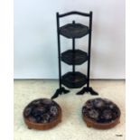 Black wood lacquer collapsible cake stand and two Victorian round footstool