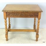 Am oak barley twist occasional table with pie crust top and carved sides. 72 x 77 x 50cm