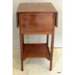 An Edwardian inlaid mahogany bedside table with twin flaps and 1 cupboard 75 x 40 x 40cm