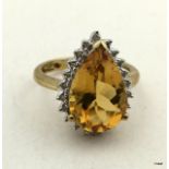 9ct gold ladies diamond dress ring set with centre amber stone size O