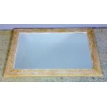 A limed oak framed mirror