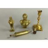 A brass icing set with nozzles and 3 other brass items