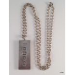 A silver ingot and chain