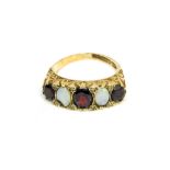 A 9ct gold ladies diamond, opal and garnet ring size M
