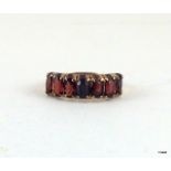 9ct gold ladies garnet 7 stone band ring size n