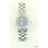 A Ladies TAG Heuer Stainless steel Quartz watch with blue dial, sapphire glass and uni directional