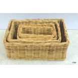 A set of 4 oblong storage baskets