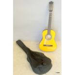An Encore classical guitar with carry case