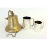 Vintage brass pub bell and 2 tankards