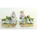 pair of Victorian posy vases depicting children with geese