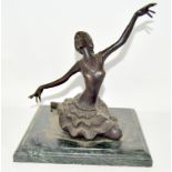 A bronze figure of a ballet dancer, set on a marble base. 21.5cm high