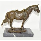 A bronze figure of a horse, set on a marble base. 25.5cm high