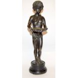 A bronze figure of a boy holding a seashell set on a marble base. 46cm