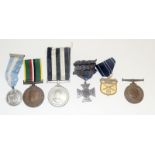 A St John Ambulance Medal with a Sultan of Brunei Medal and other military medals