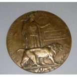 A WW1 Memorial Plaque or Death Penny awarded to Reginald Arthur Lawley of the Warwickshire