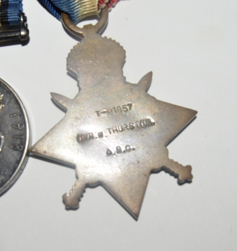 A mounted WW1 Mons Star with clasp medal trio named to T-21857 Driver W Thurston of the Army Service - Image 4 of 4