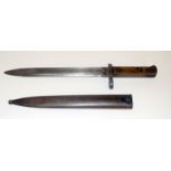 An Austrian Model 1895 Carbine Knife Bayonet in its steel scabbard. 24cms blade length