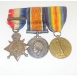 A mounted WW1 Mons Star with clasp medal trio named to T-21857 Driver W Thurston of the Army Service