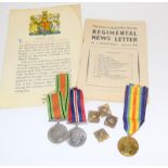 A WW1 Victory Medal named to Lieutenant T.L. Barnes with two WW2 medals, some badges, Grenadier