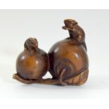 Japanese carved netsuke of two mice on peaches signed to the base