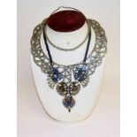 Very ornate necklaces set with a hair band and stand