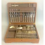 A part complete Mappin & Webb cutlery set in oak fitted box