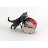 Cold painted bronze of a cat playing a drum