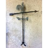 Wrought iron weather vane depicting chickens