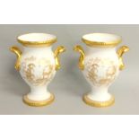 Pair of Spode twin handled vases with gilt decoration in the urn form 20cm tall