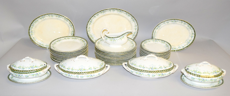 A dinner set including soup tureens dinner plates etc