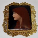 Late 19C porcelain painting of a lady in the form of a brooch