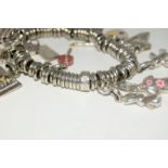 Genuine Links of London silver charm bracelet and charms