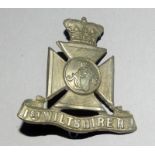 A rare white metal cap badge to the 1st Wiltshire Rifle Volunteers 4.5cms by 4.5cms