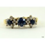 18ct gold ladies diamond and sapphire ring size K