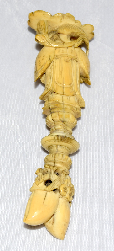 Ivory carved figure of a Chinese man standing on pine nuts - Image 4 of 7